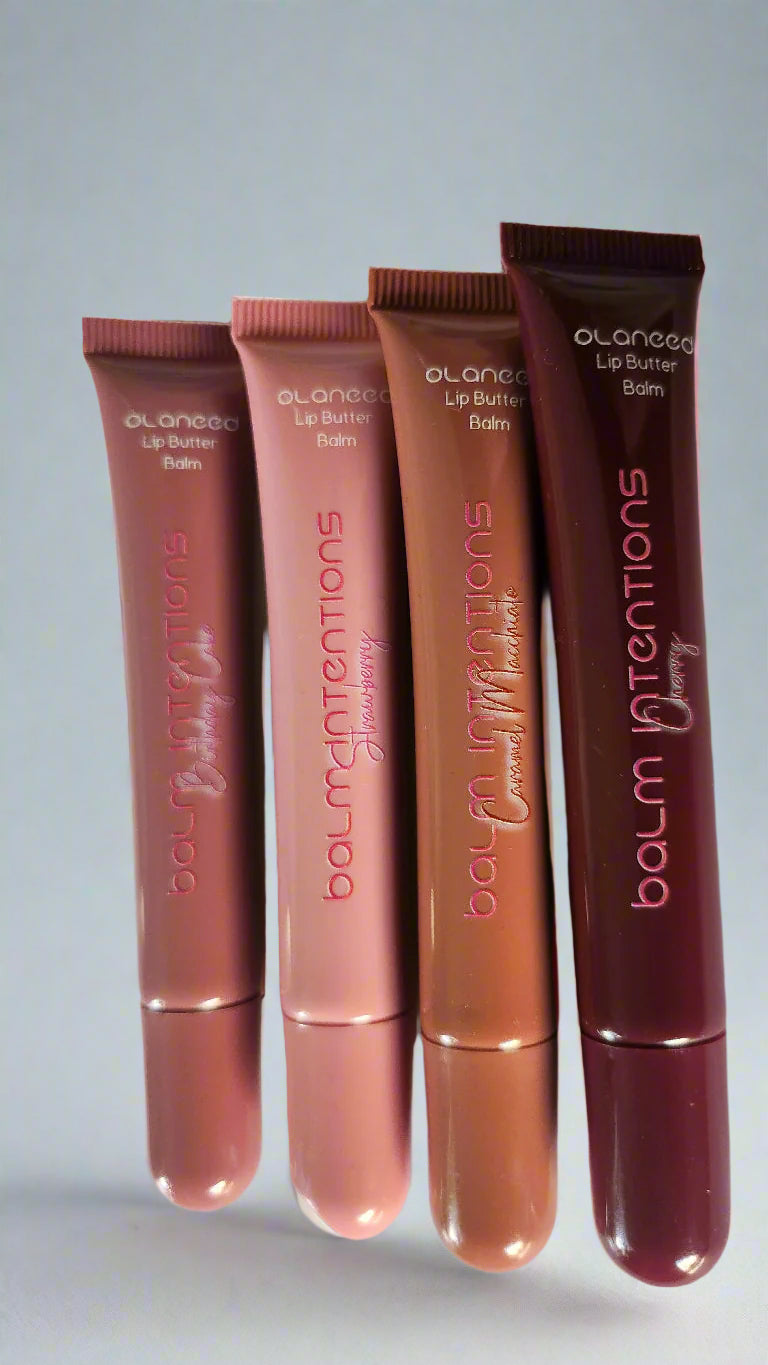 Four lip balm tubes from the brand 'balm intentions' on a white background