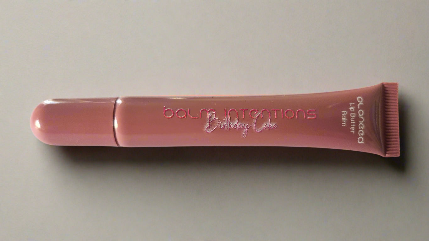 Lip balm tube with 'Balm Intention' branding on a white background