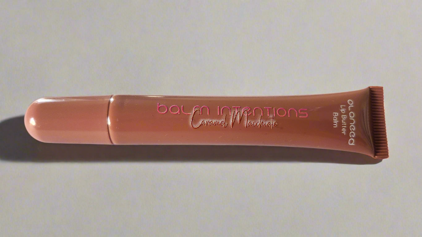 Lip gloss with 'Balanit Intentions' text on a white background